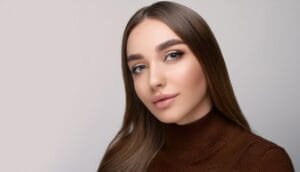 Firefly Makeup for the fall winter season a young woman with Defined and Natural Brows 20124