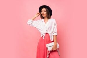fashion photo graceful brunette woman spring outfit posing holding white bag