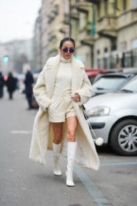 La Milano, "no pants - no problem!" 1 yoyo cao wears sunglasses earrings a white turtleneck news photo 1708724656