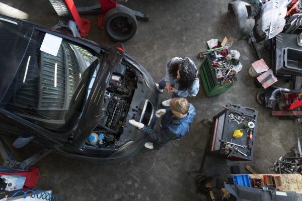 top view man repairing car (1)